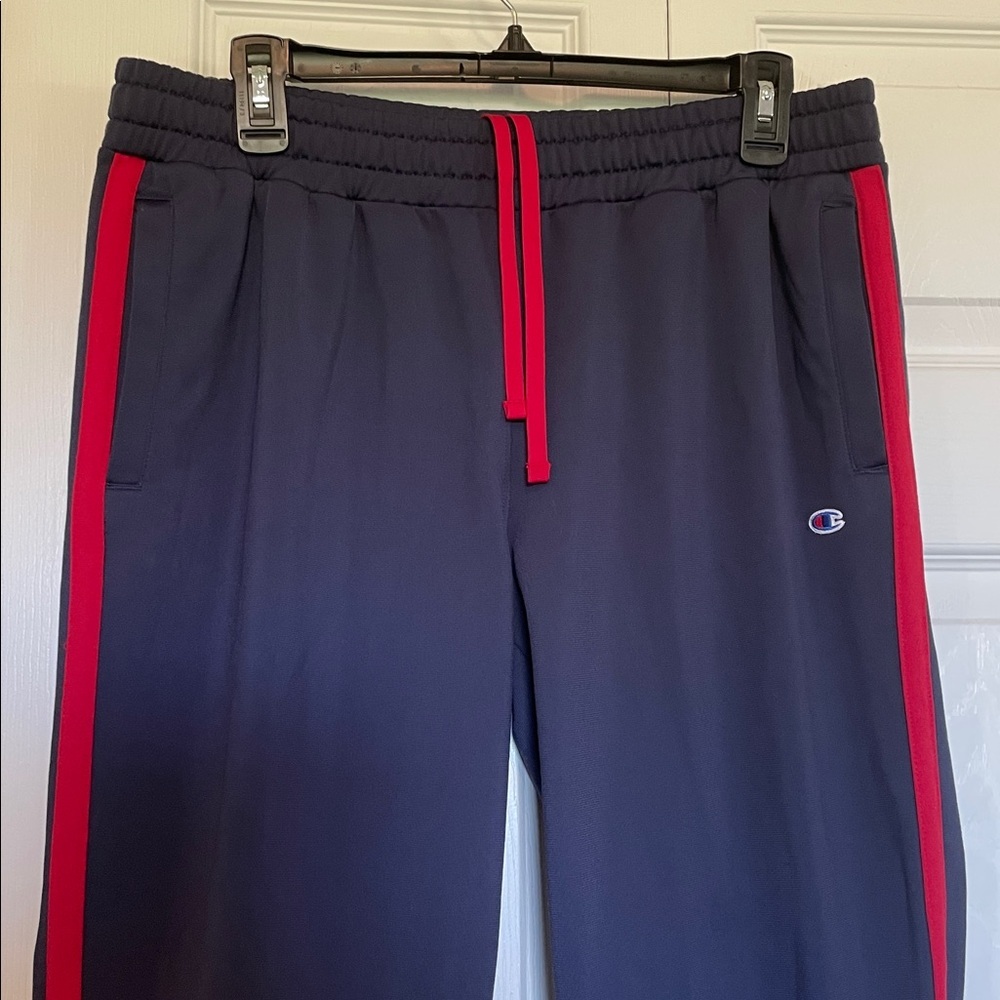VTG Women’s M Champion track pants blue with red side stripe pockets zip ankles